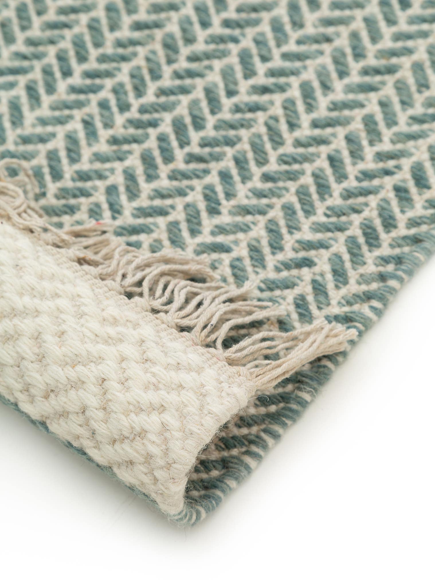 Rug made of 60% Wool, 40% Cotton in Green with a 1- 5 mm high pile by benuta Pure