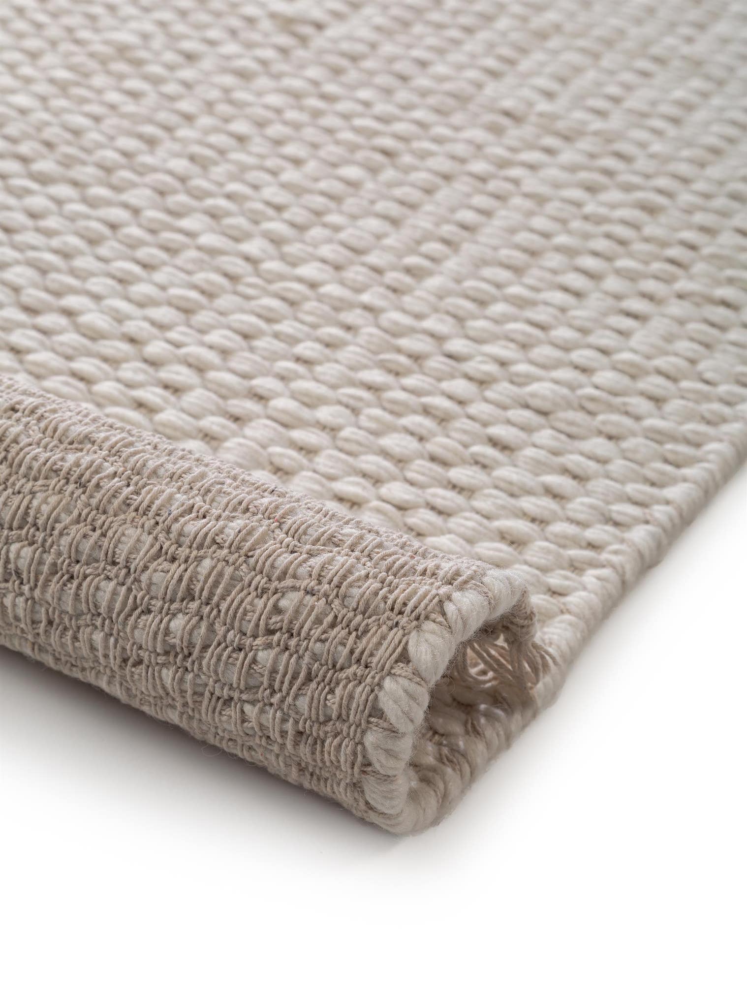 Teppich aus 40% Wolle, 30% Baumwolle, 30% Viskose in Beige mit bis 5 mm hohem Flor von benuta Pure